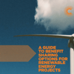 A wind turbine against a blue sky background with the Clean Energy Council logo